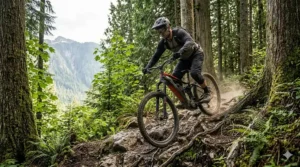 An infographic showing the ideal geometry for an enduro eMTB designed to handle technical trails and steep descents in the Canadian Rockies.