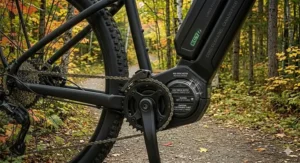 A comparison illustration highlighting the efficiency and lower maintenance of a hardtail electric mountain bike for Canadian trail riders.