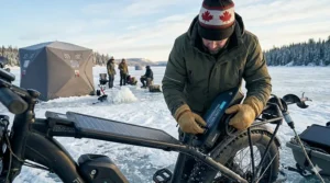 A specialized cold-weather-rated ebike battery, designed to maintain power in extreme Canadian winter temperatures for ice fishing.