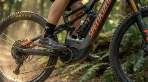 Close-up of an e-mtb motor assisting a teenager on a steep Canadian hill.