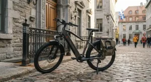 A rugged 75nm torque electric bike parked neatly near historic architecture on a Montreal street.