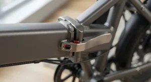 Close-up illustration of a secure frame hinge utilizing a reliable folding ebike mechanism for durable performance across Canada.