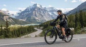 Touring the Canadian Rockies on a long-range premium electric bike with scenic mountain views.