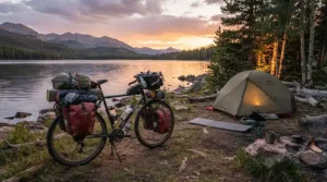A loaded versatile do-it-all electric bike equipped with front and rear racks for weekend camping trips